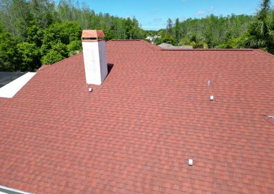 Aerial image of a red shingle roof showing preparation for solar panel installation, performed by Smart Volt Solutions.