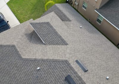 Close-up aerial view of a residential roof evaluated for solar panel installation by Smart Volt Solutions.