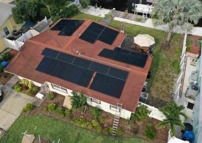 Fully Installed Solar Panels on Residential Red Tile Roof