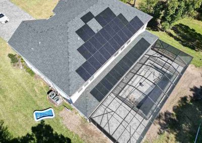 Aerial View of Solar Panels on Large Residential Roof