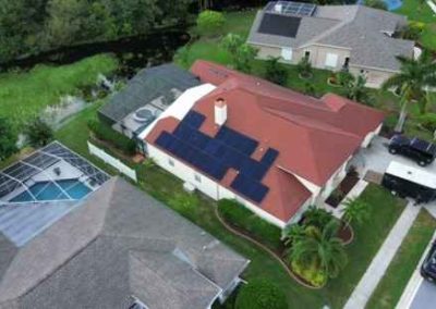 Overhead view of a completed solar panel installation on a residential roof by Smart Volt Solutions, showcasing clean energy integration.