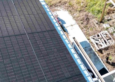 Solar Panel Edge Along Metal Roof and Gutter