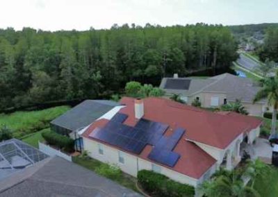 Aerial view of a roof with installed solar panels, showcasing a completed solar energy system by Smart Volt Solutions.