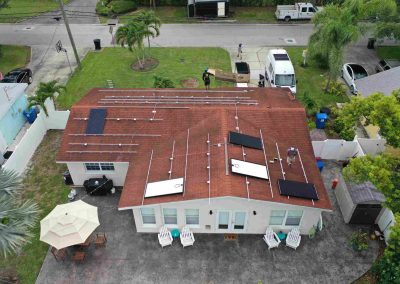 Solar Panel Installation in Progress on Residential Roof