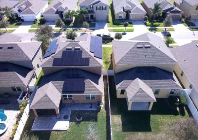 Solar Panel Installation on Residential Roofs in Suburban Area