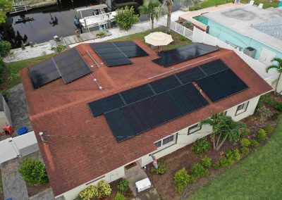 Solar Panel Installation on Waterfront Home Roof