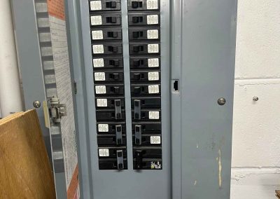 Electrical panel showing breakers connected to the solar system, installed by Smart Volt Solutions.