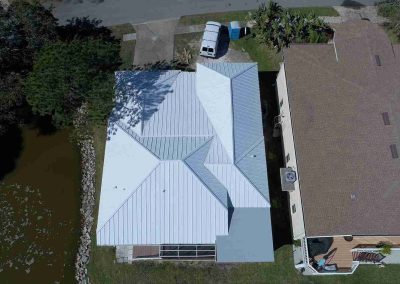 Energy-Efficient Metal Roof Installation Near Waterfront by Smart Volt Solutions