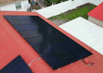 Drone Install of Solar Panel System on Red Roof by Smart Volt Solutions